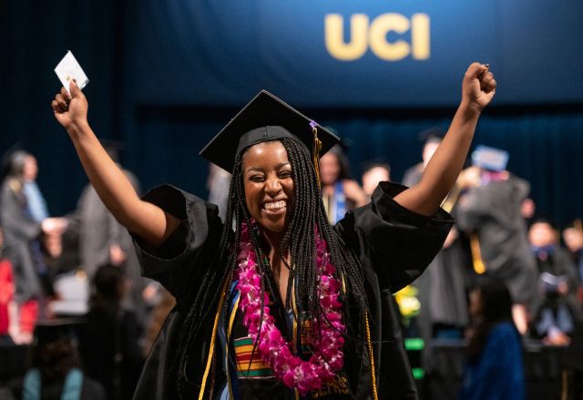 student celebrating her commencement